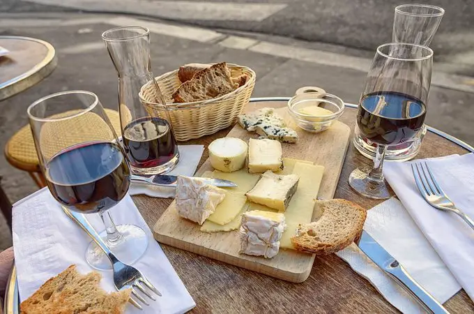 A cheese platter and wine