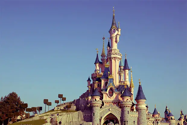 Sleeping Beauty castle Disneyland Paris sun