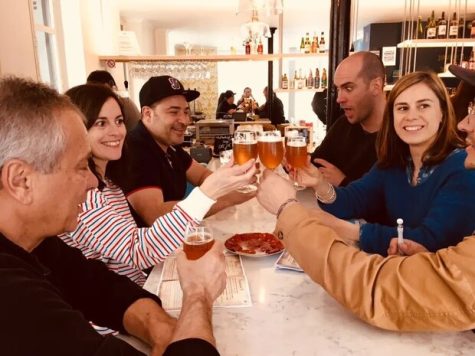 Friends cheering with beers