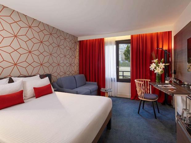 A bedroom in Novotel Paris Les Halles