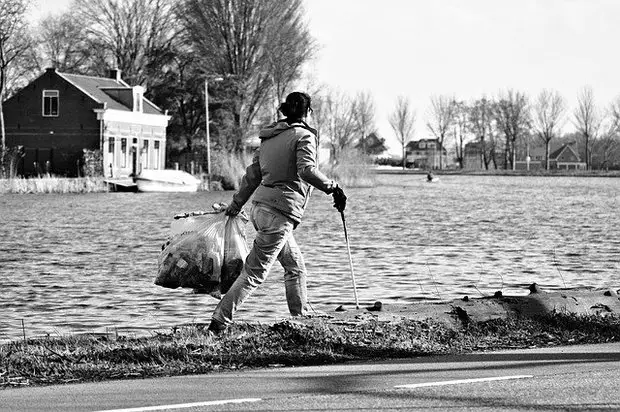 Person cleaning the street