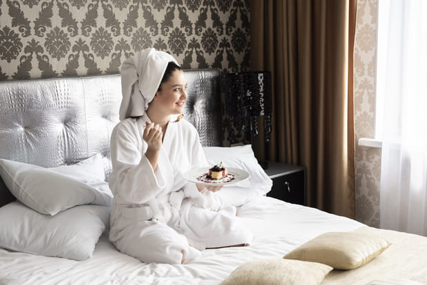 girl enjoying spa day with cake